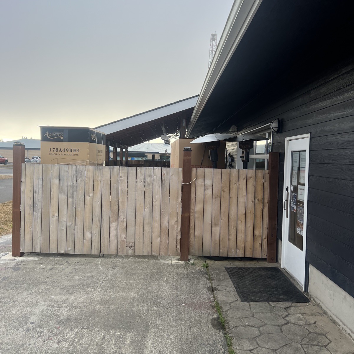 Horizontal wood slat privacy screen at home entry